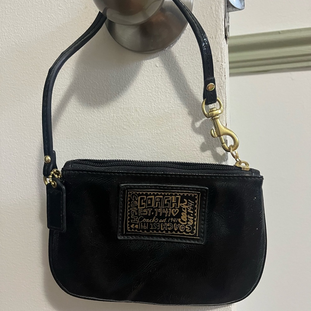Coach Black Wristlet with Gold Accents